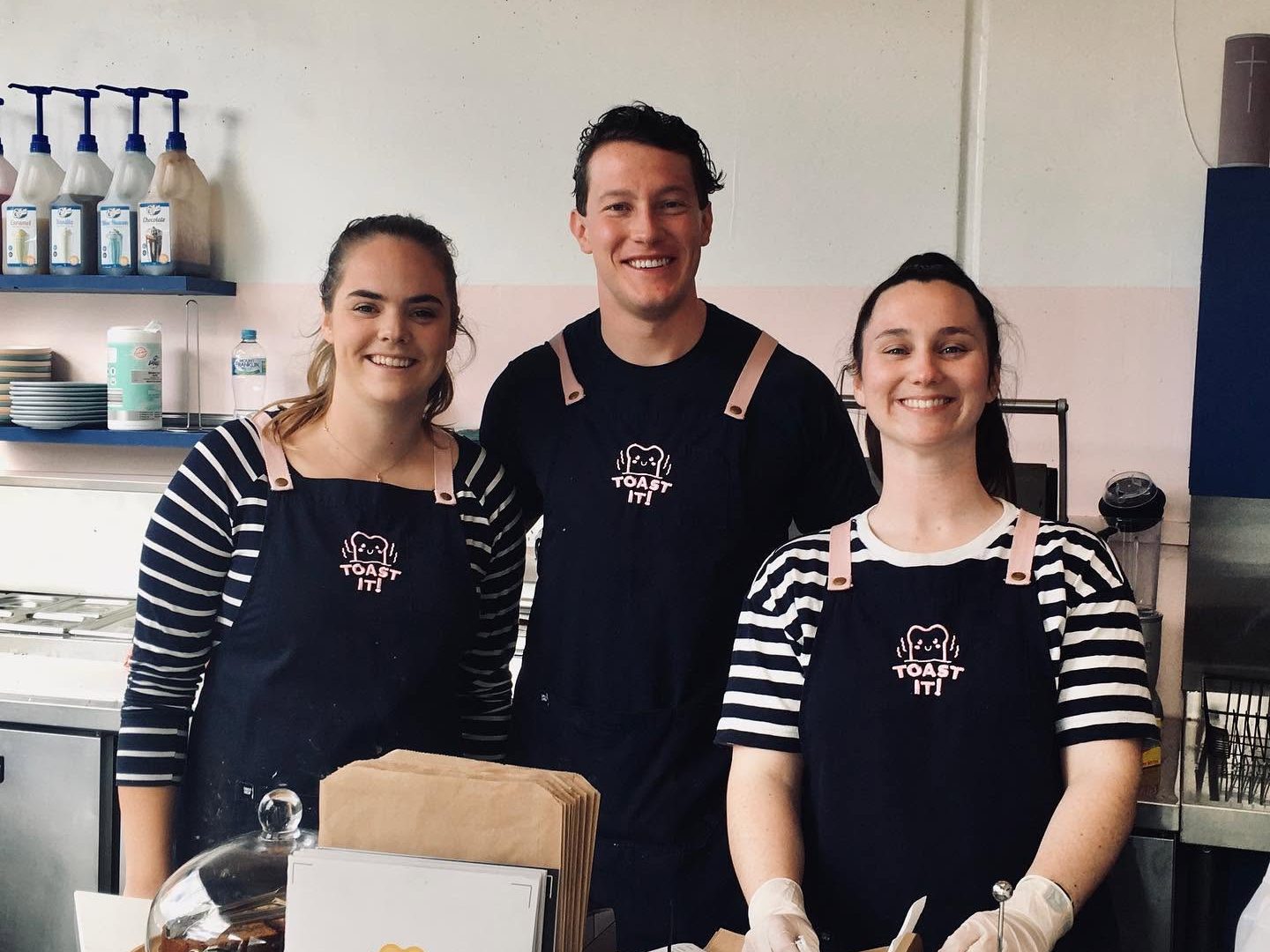* TOAST IT! * ____________________________________________ TWO CAFES. ONE SIGNATURE.ONE BRAND.____________________________________ ICONIC TOASTIES & SPECIALTY COFFEE.