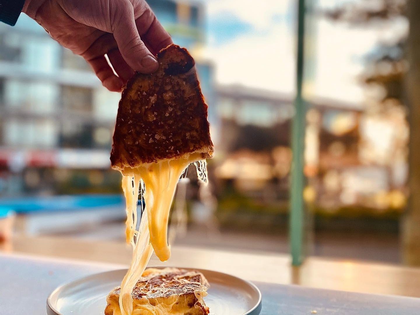 * TOAST IT! * ____________________________________________ TWO CAFES. ONE SIGNATURE.ONE BRAND.____________________________________ ICONIC TOASTIES & SPECIALTY COFFEE.