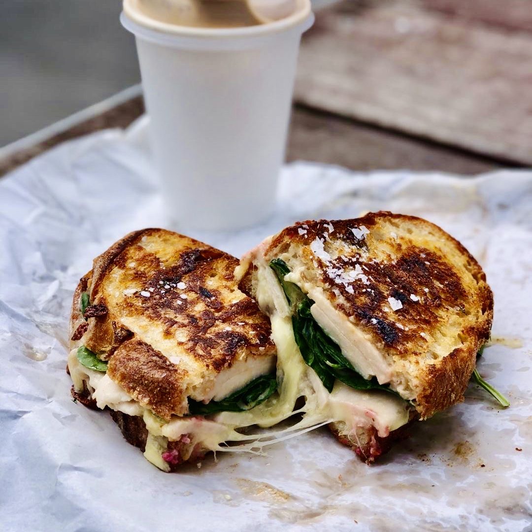 * TOAST IT! * ____________________________________________ TWO CAFES. ONE SIGNATURE.ONE BRAND.____________________________________ ICONIC TOASTIES & SPECIALTY COFFEE.
