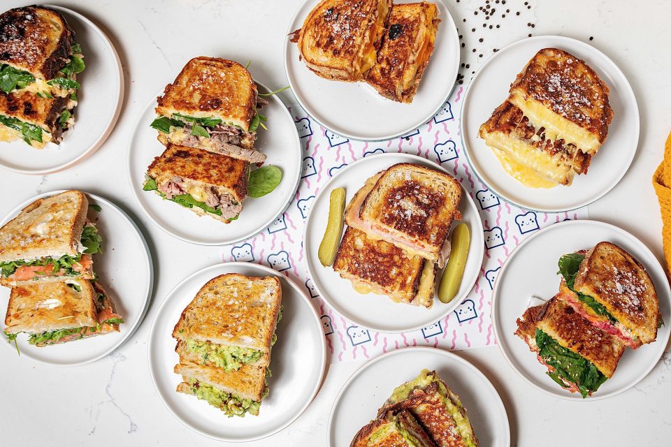 * TOAST IT! * __ TWO CAFES. ONE SIGNATURE.ONE BRAND. ICONIC TOASTIES & SPECIALTY COFFEE.